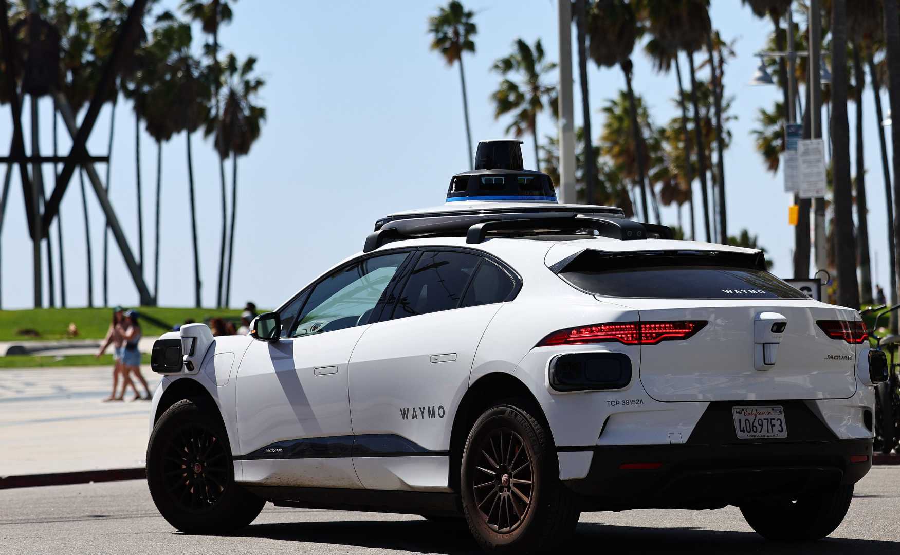 Waymo Autonomous Jaguar Taxi On Los Angeles Freeway