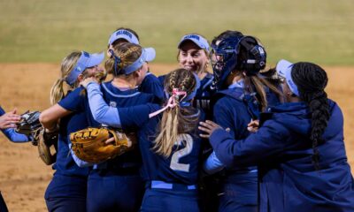 Creighton Softball Players Warming Up Before A Game