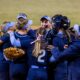 Creighton Softball Players Warming Up Before A Game