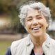 Elderly Woman Smiling Outdoors