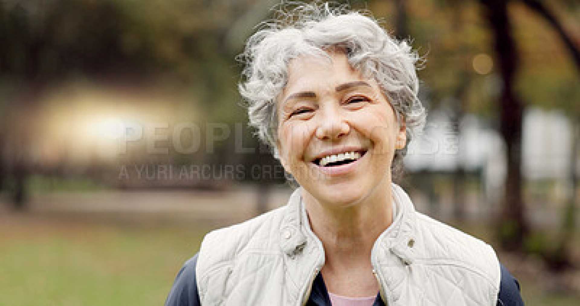 Elderly Woman Smiling Outdoors