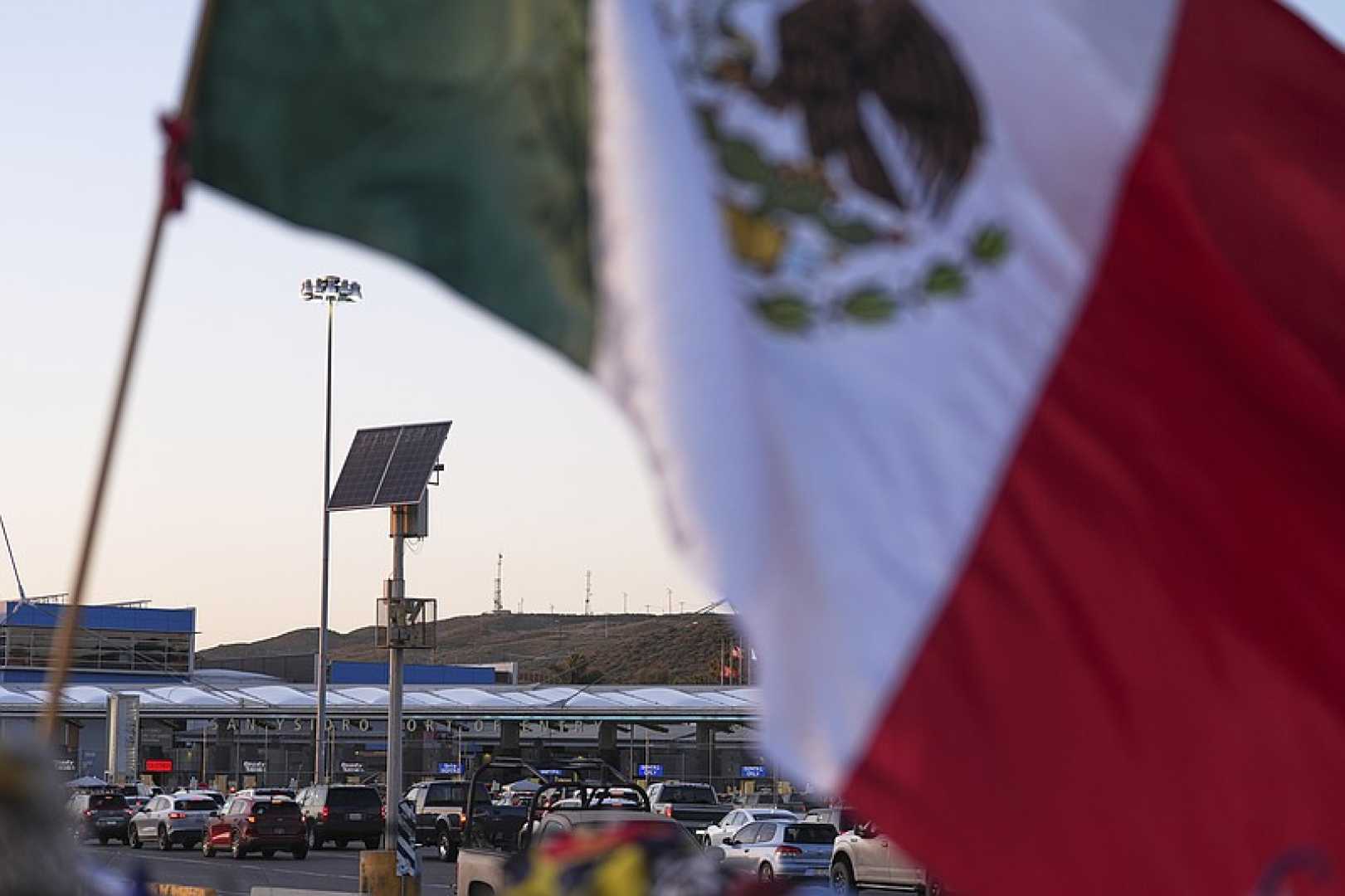 European Flags And U.s. Border Crossing Sign