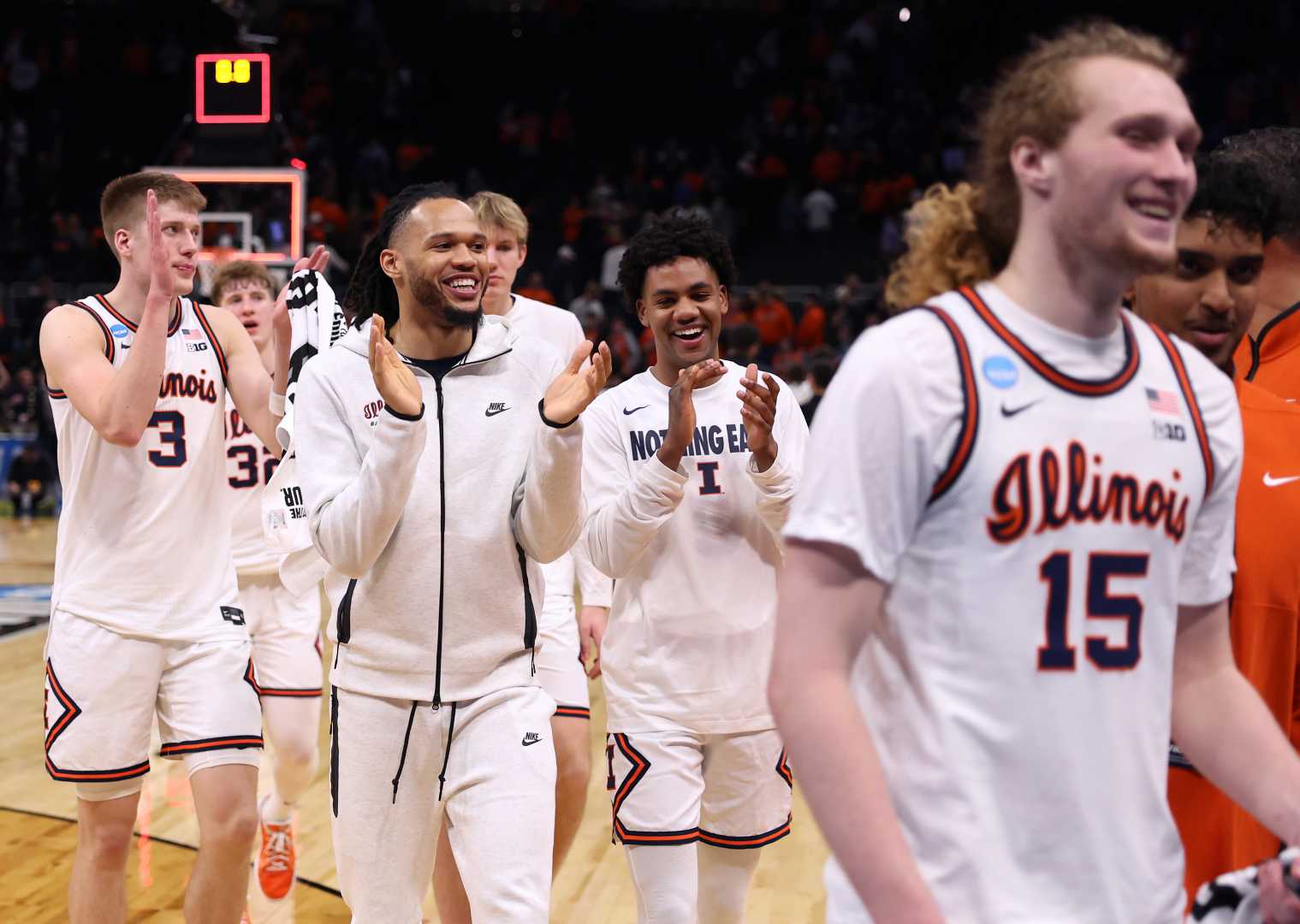 Illinois Ncaa Basketball Tournament Players Celebrating