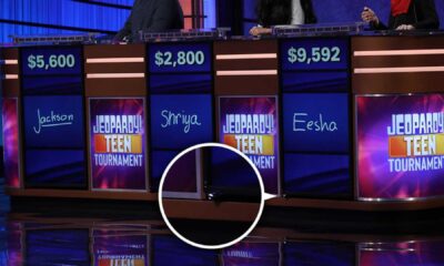 Jeopardy! Game Show Contestants At Podiums