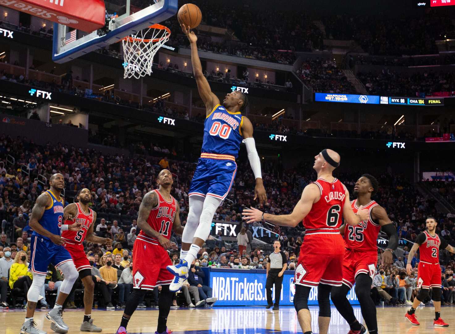 Jonathan Kuminga Dunking During A Basketball Game