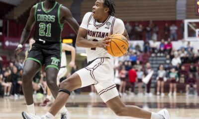 Montana Grizzlies Basketball Team In Action