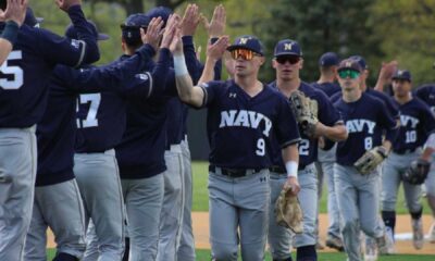 Navy Baseball Team Celebrating Victory On The Field