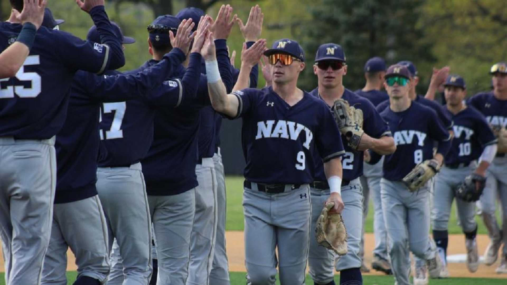 Navy Baseball Team Celebrating Victory On The Field