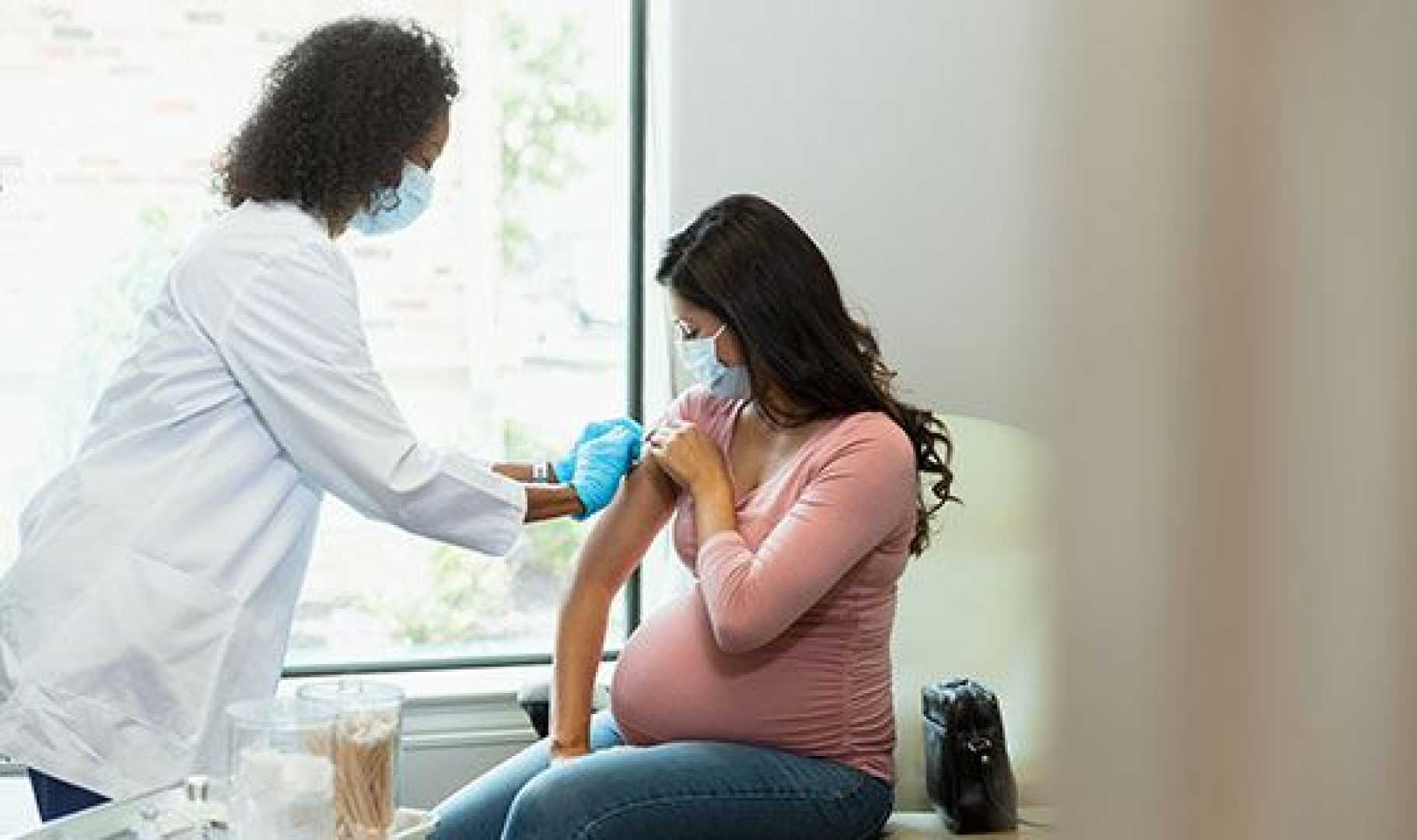 Pregnant Woman Doctor Immunization