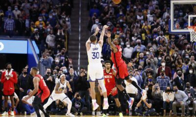 Stephen Curry Shooting A Basketball In An Nba Game