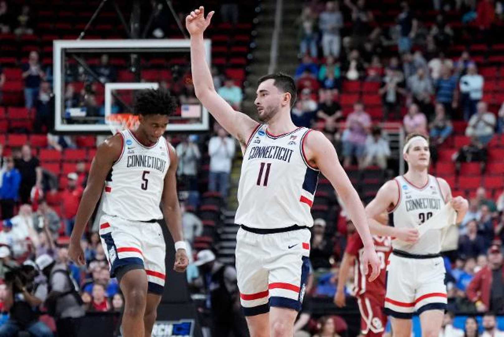 Uconn Basketball Team Celebrates Ncaa Win Against Oklahoma