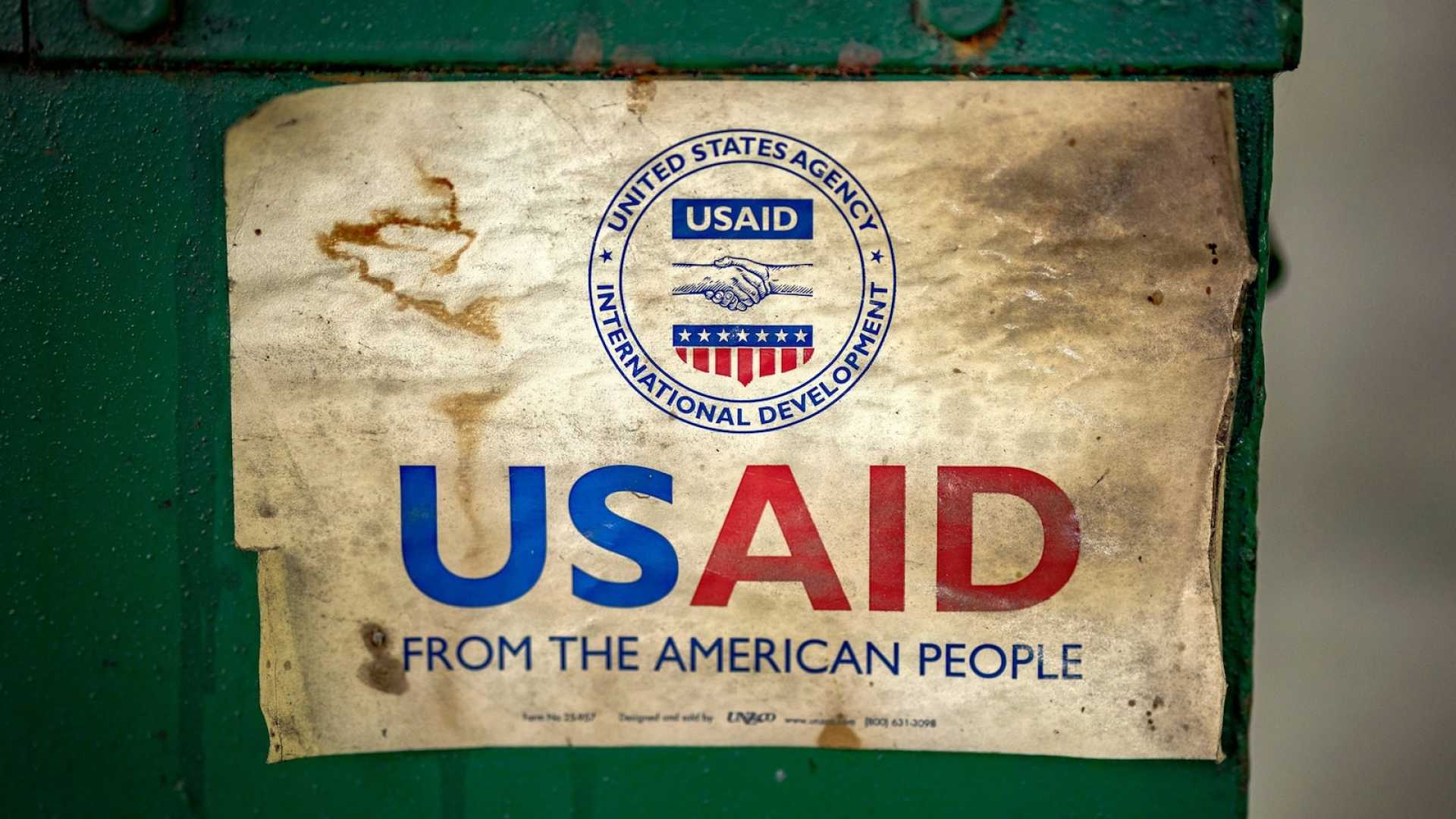 Usaid Logo And Trump Administration Officials