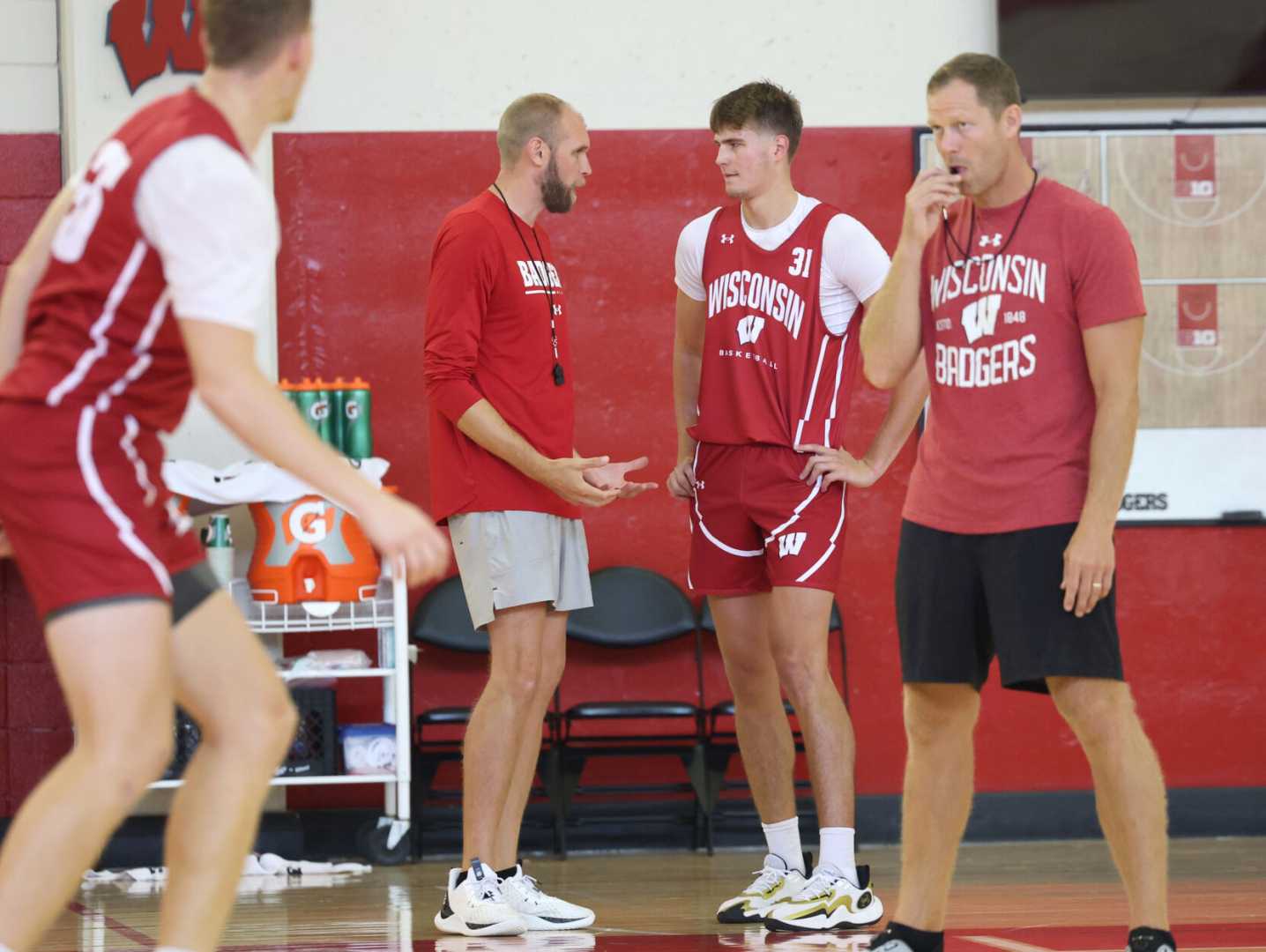 Wisconsin Badgers Football And Basketball Team Practice