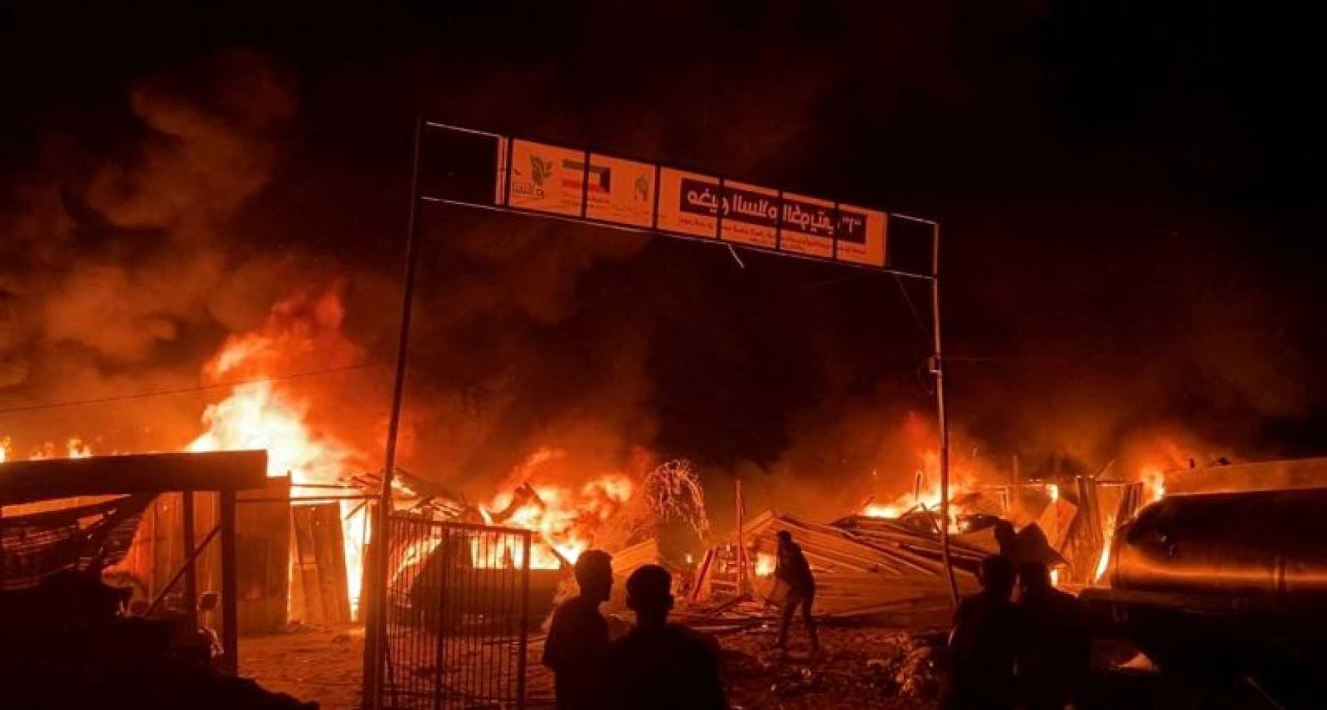 Gaza Airstrikes Aftermath Tents Burning