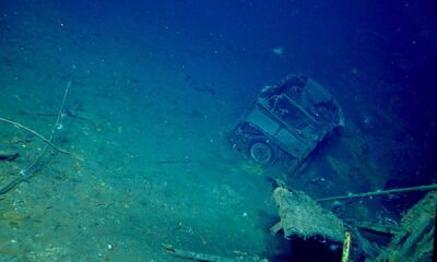 Uss Yorktown Wreckage With Vintage Ford Super Deluxe