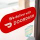 Doordash Logo Sign At Restaurant