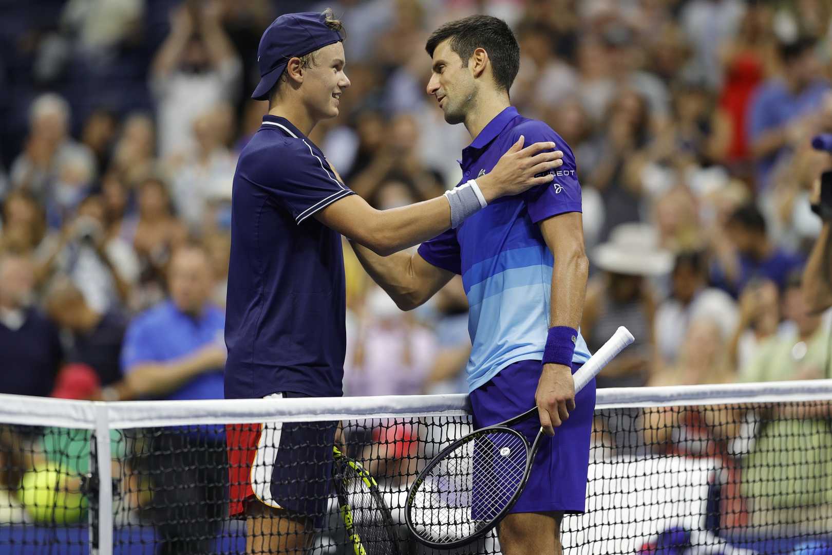Holger Rune And Novak Djokovic Tennis