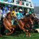 Kentucky Derby Horses And Jockeys At Churchill Downs