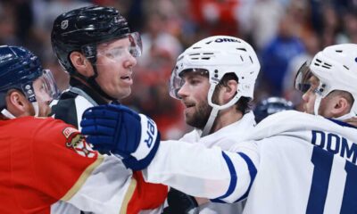 Max Domi Boarding Aleksander Barkov