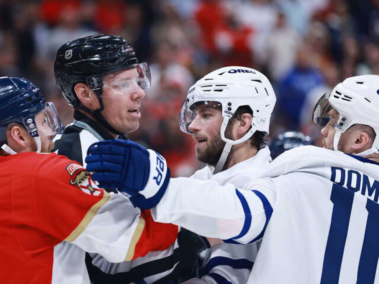 Max Domi Boarding Aleksander Barkov