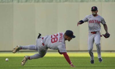 Rafael Devers And Garrett Crochet In Action