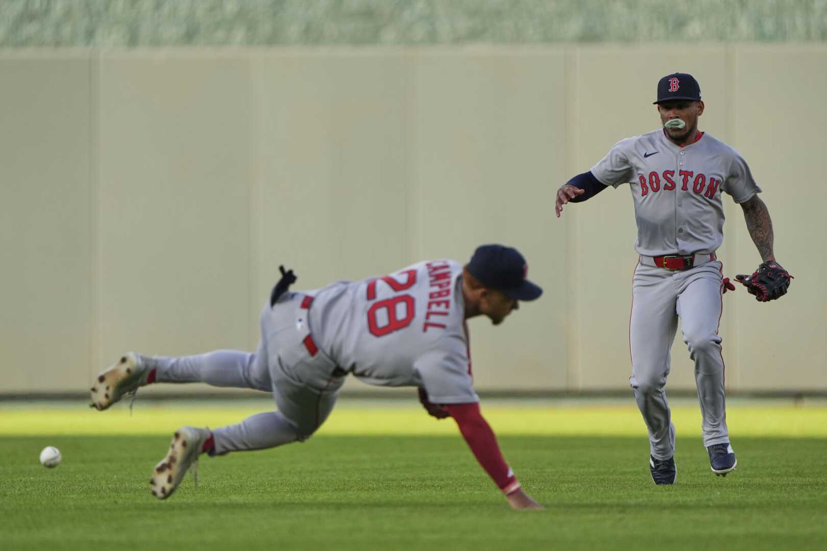 Rafael Devers And Garrett Crochet In Action