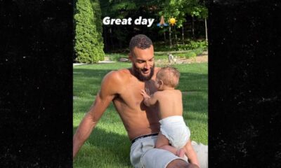 Rudy Gobert And Son Playing Outdoors