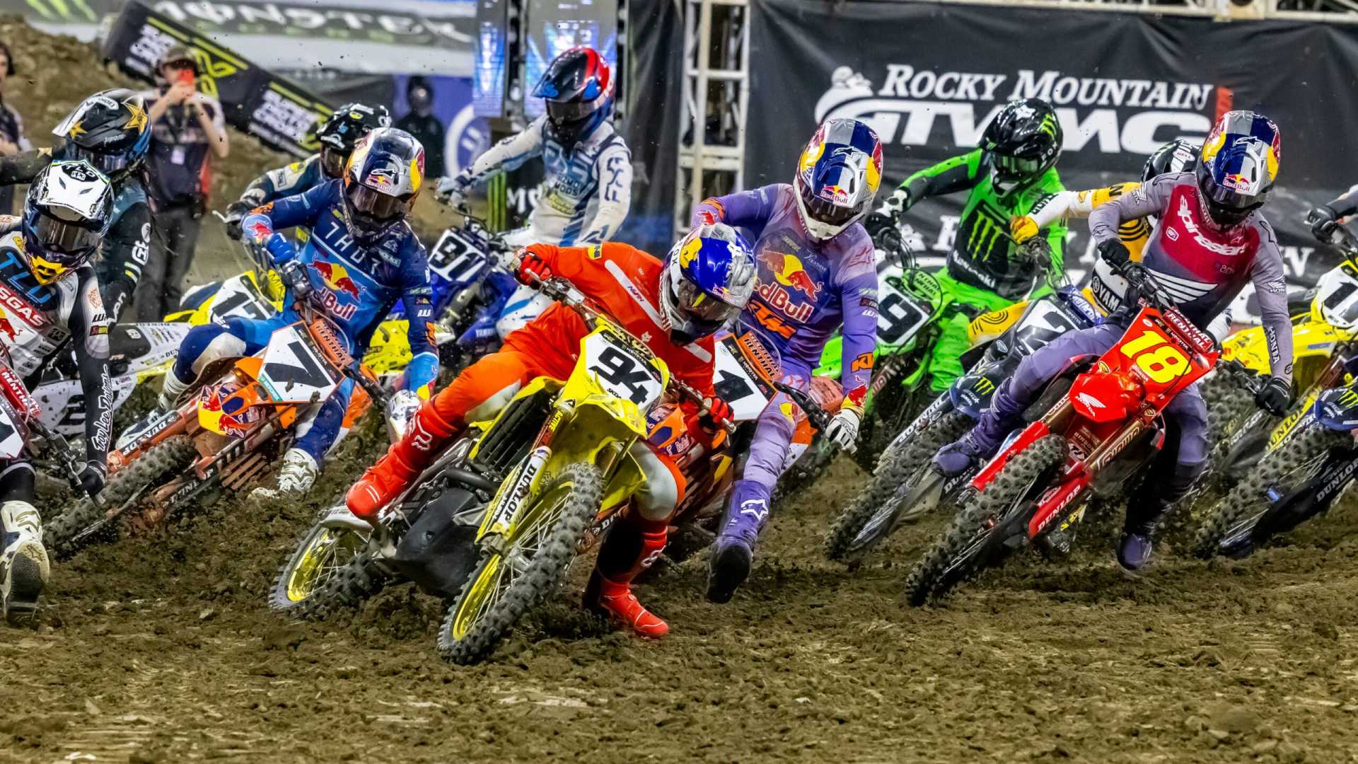 Supercross Racers On Dirt Track