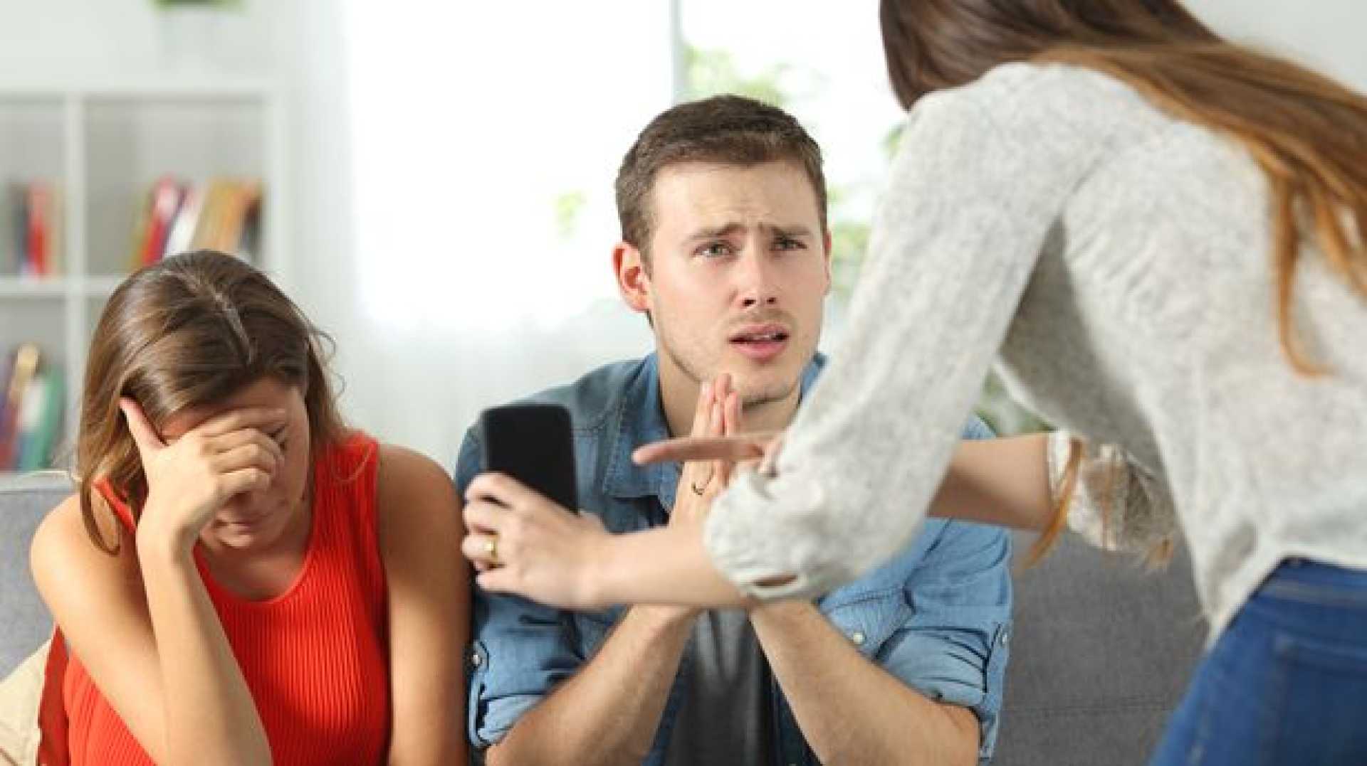 Woman Arguing With Husband And Best Friend
