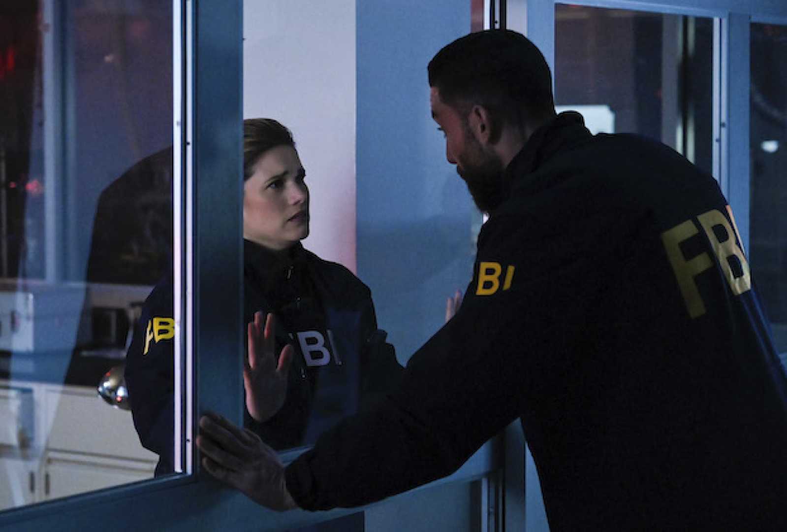 Fbi Tv Series Characters In Suspenseful Scene