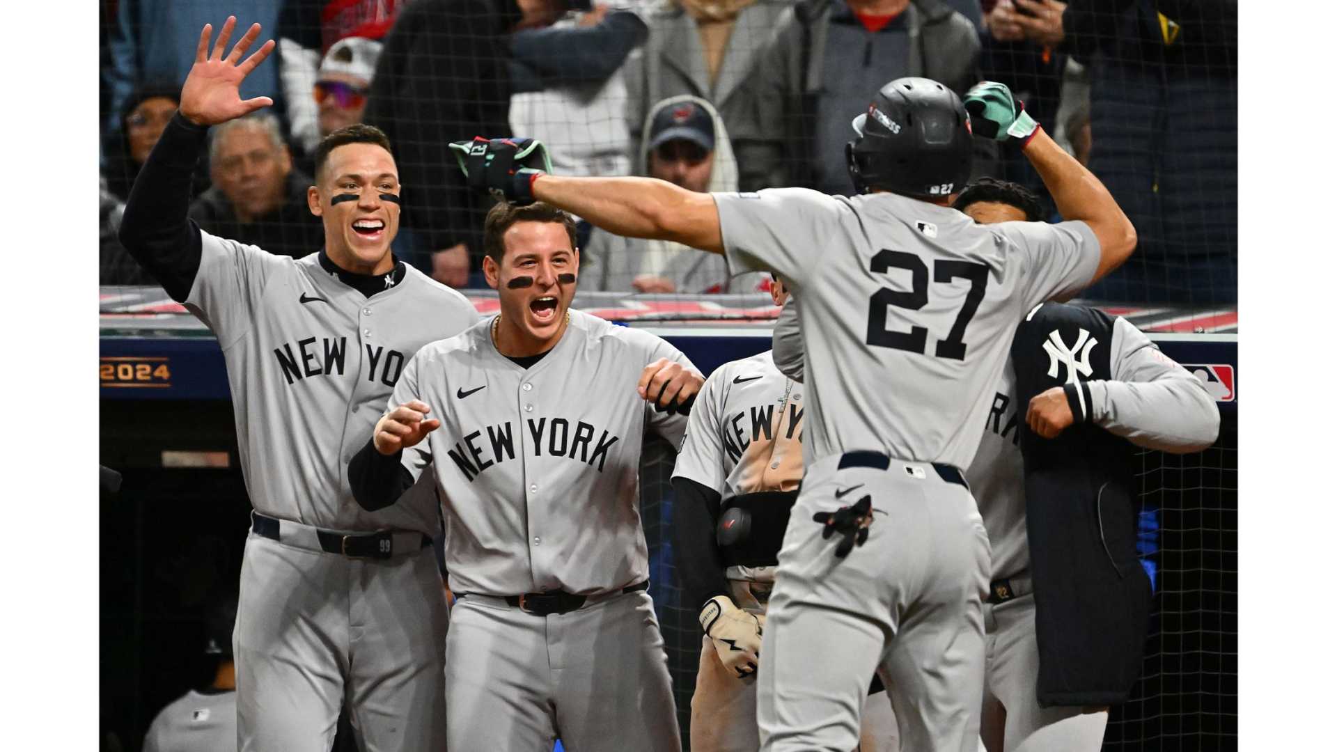New York Yankees Logo And Players In Action