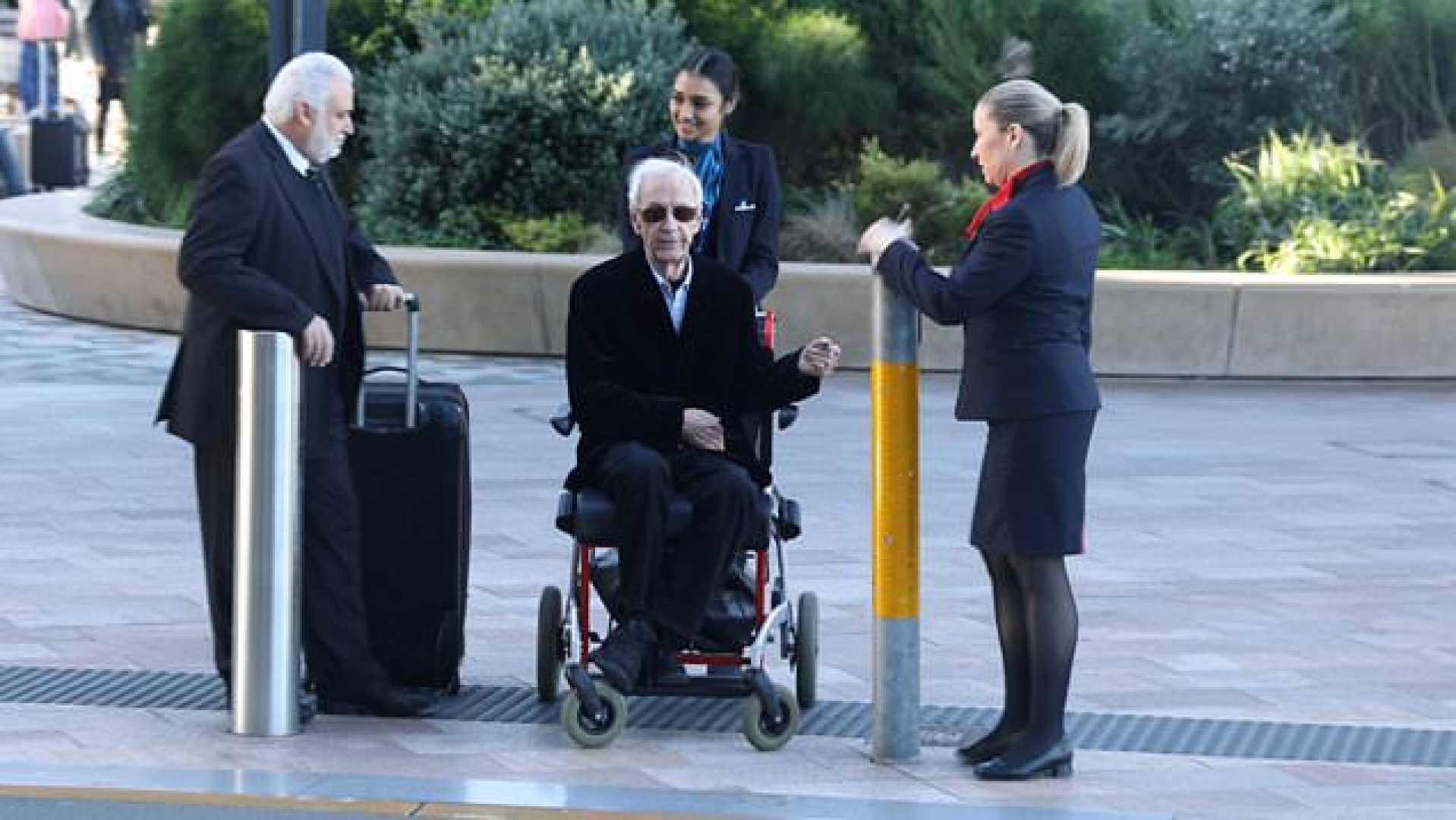 Paul Hogan Sydney Airport Wheelchair