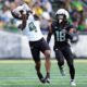 Oregon Ducks Wide Receivers Dakorien Moore Malik Benson