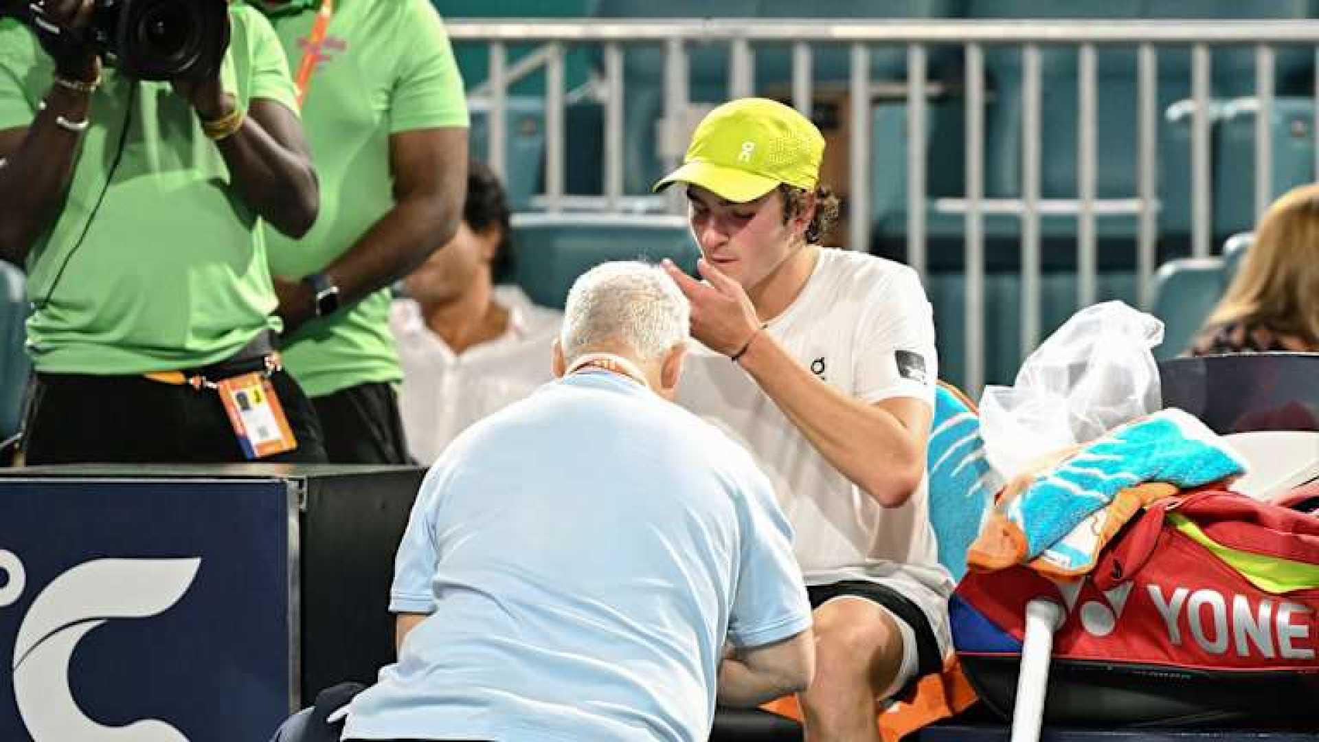 Brazilian Tennis Player Coaching During Match